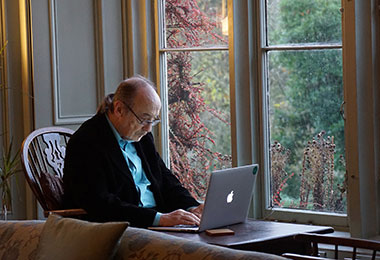man on a computer